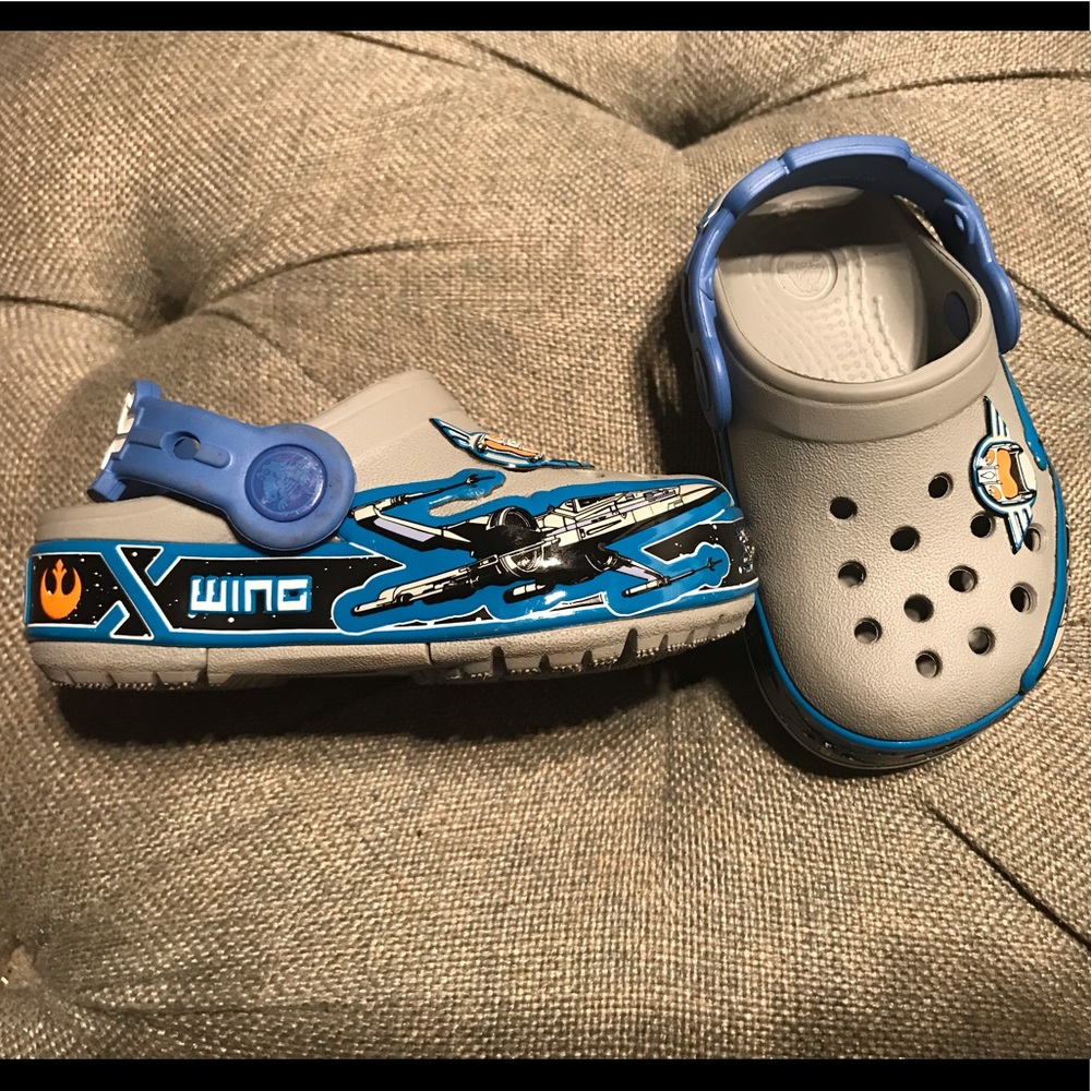Crocs.  Toddler size 6. Star Wars, light up.